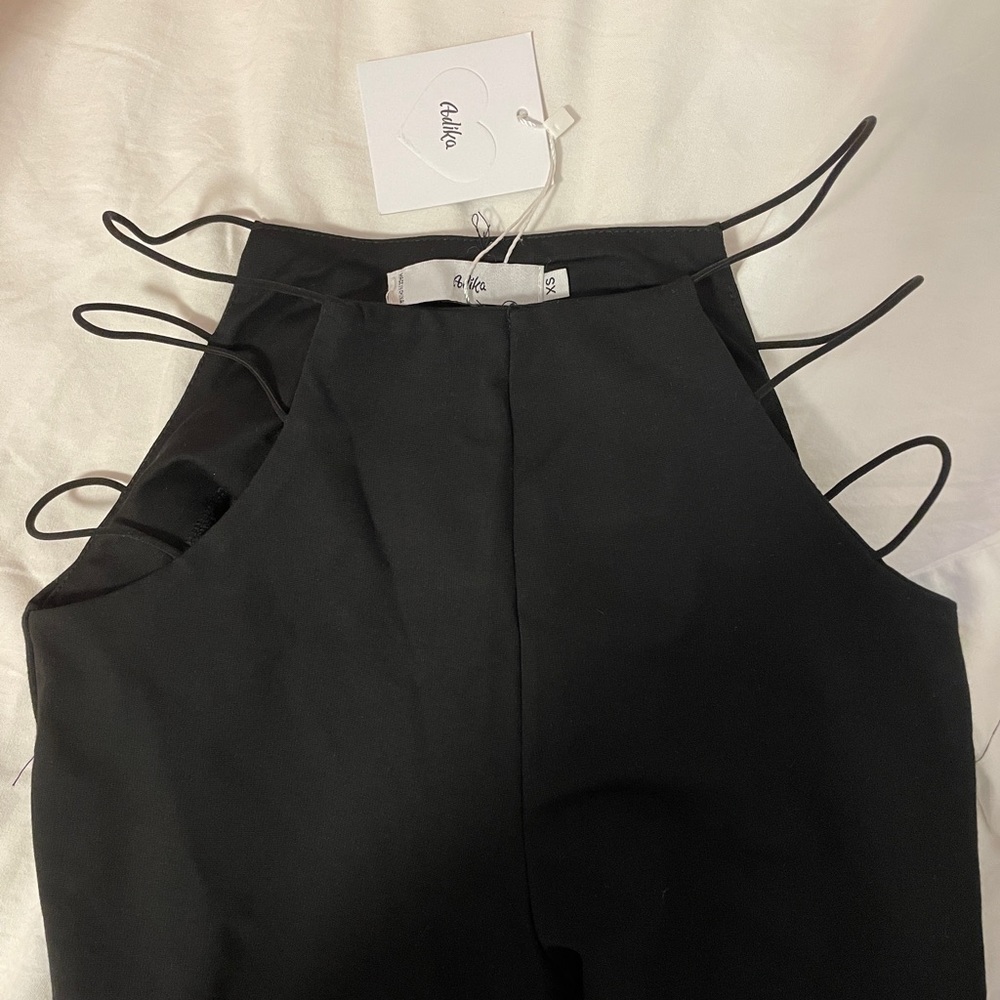 adika black empire flare cutout pants